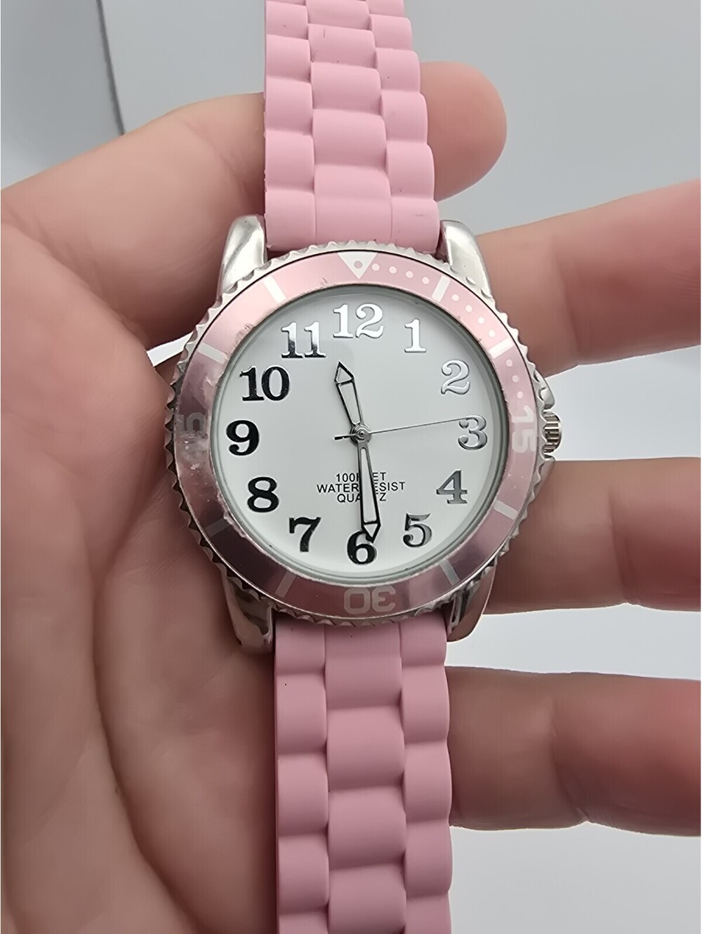 White Dial Pink Bezel Round Silver Tone Case Pink Silicone Band Watch